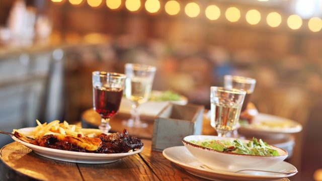 Tasty dishes on table in restaurant