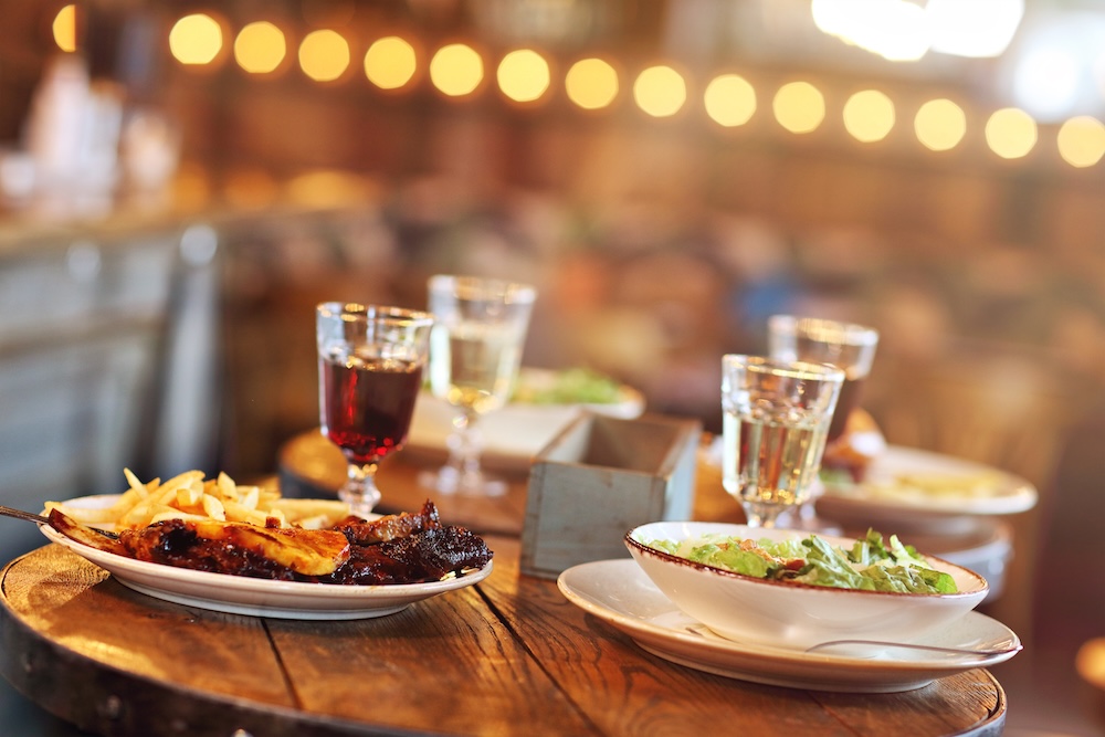 Tasty dishes on table in restaurant