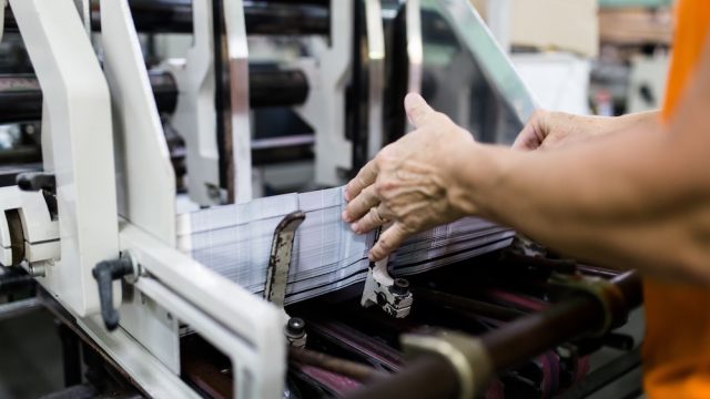 Machinery and printing processes in a modern printing house.
